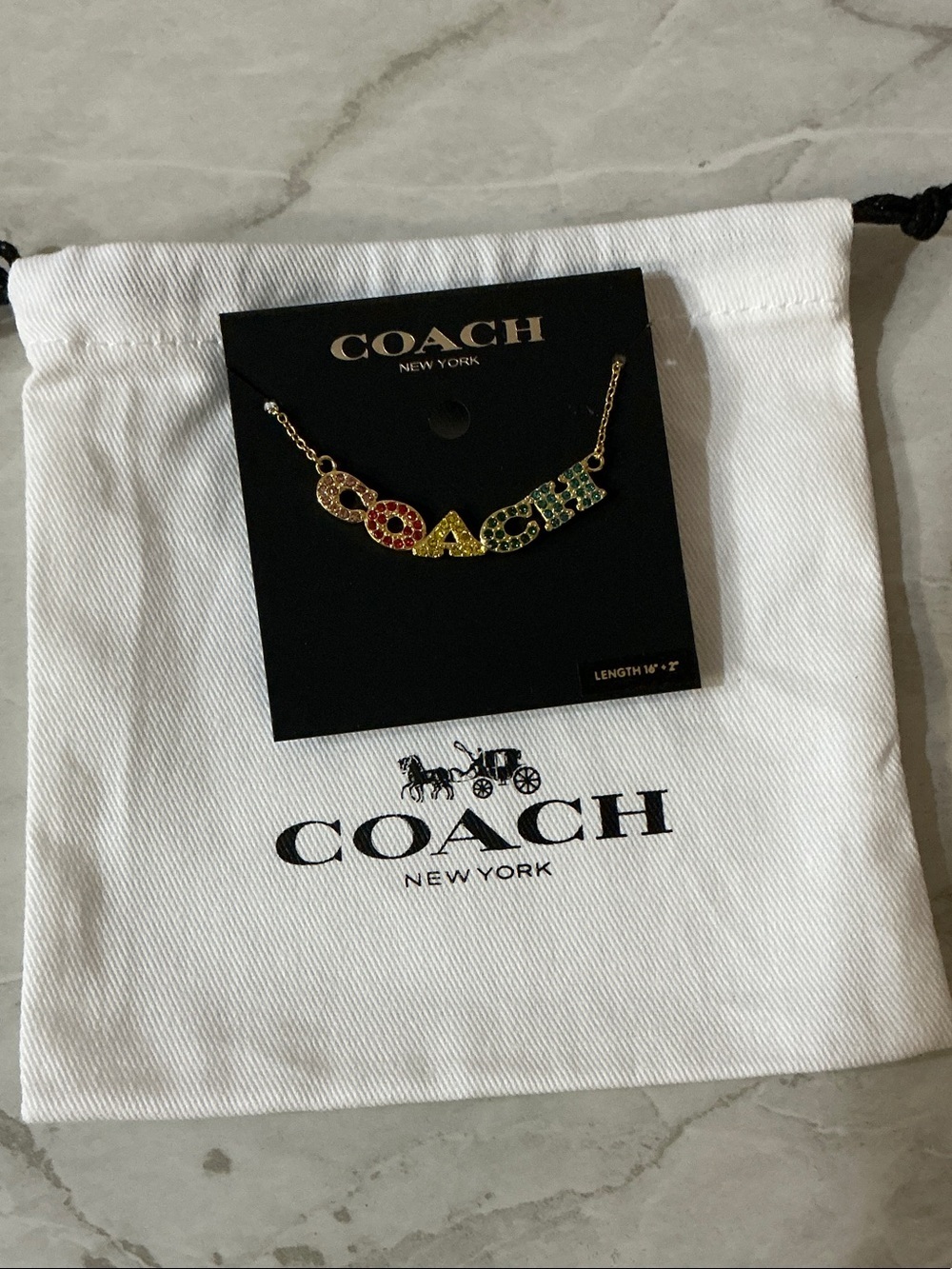 Coach Gold-Tone Logo Necklace with Rainbow Crystal Accents